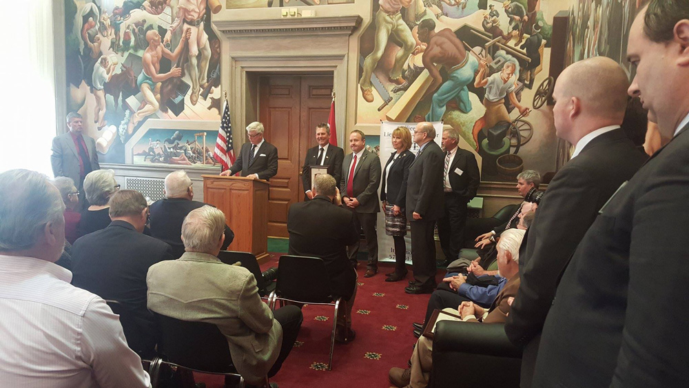 Mike receiving the Missouri Lt Governor Peter Kindle Veteran's Service Award.